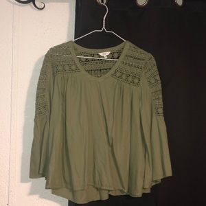 Green knitted blouse
